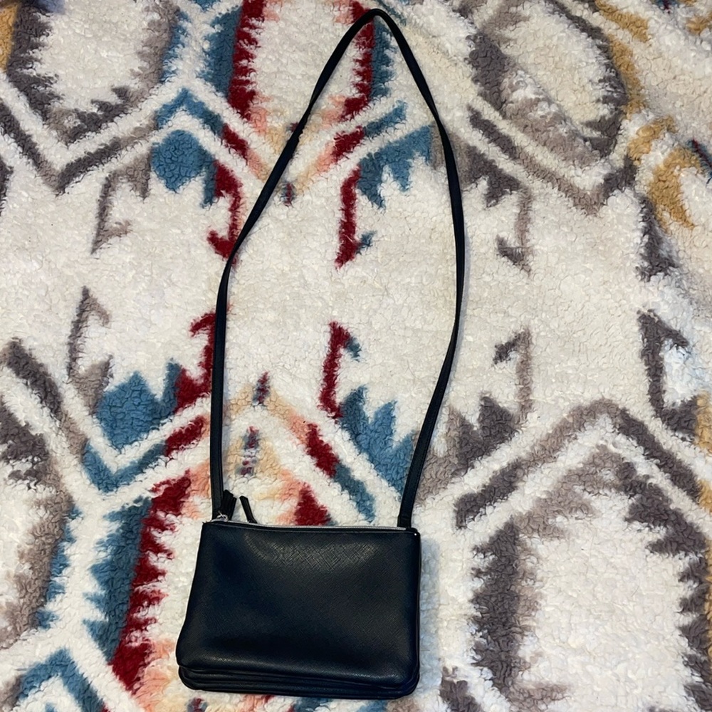 Women’s mini black purse, three pockets with silver accents new no tags